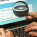 A person using a laptop and searching about online sweepstakes
