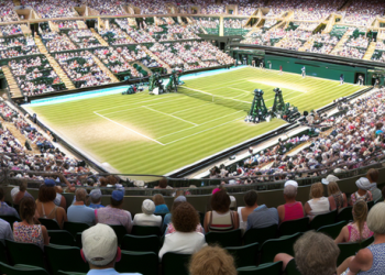 An interior shot of Englands Wimbledon stadium filled with an audience during a match