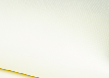 The I AM Natural Latex Pillow displayed against a white backdrop showing its firm structure and cool exterior